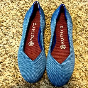 Light blue Rothy’s. In excellent condition.